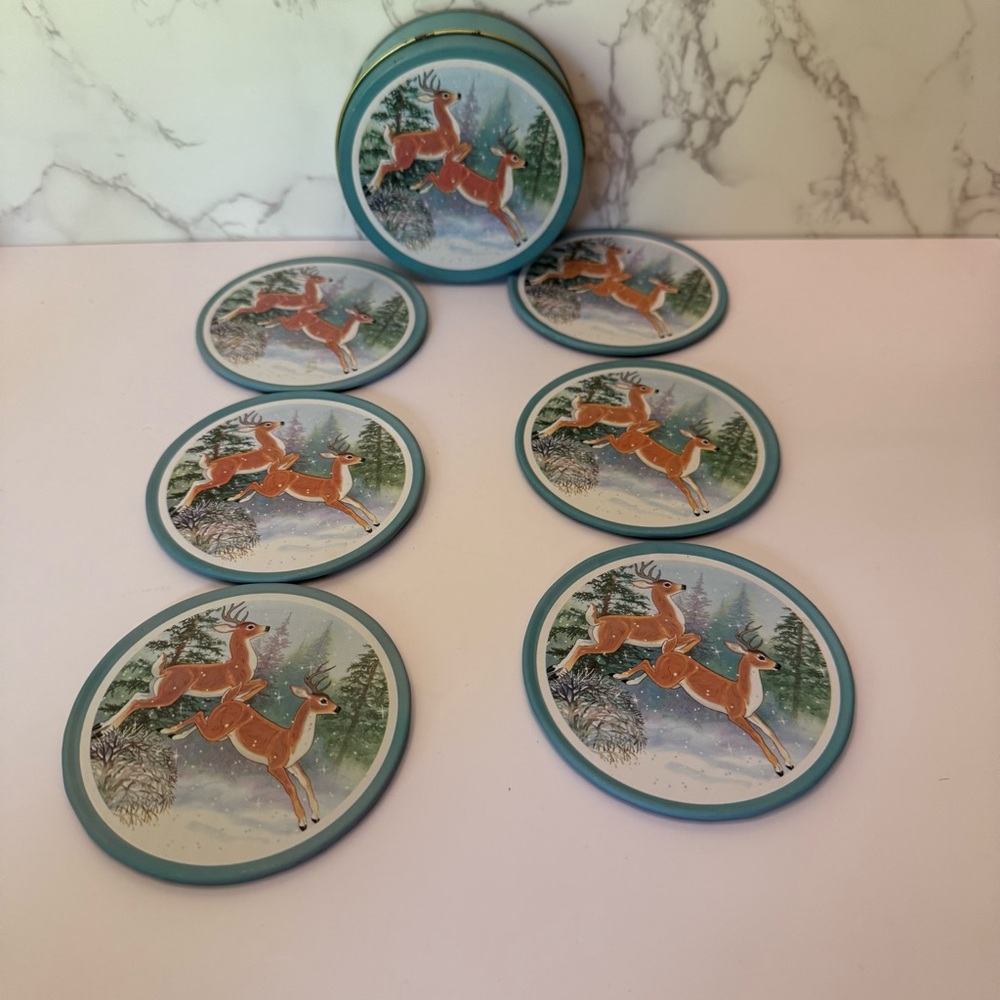 J.S.N.Y. JSNY Coaster Set 6 Round Cork Coasters With Tin Winter Deer 1970s Vtg